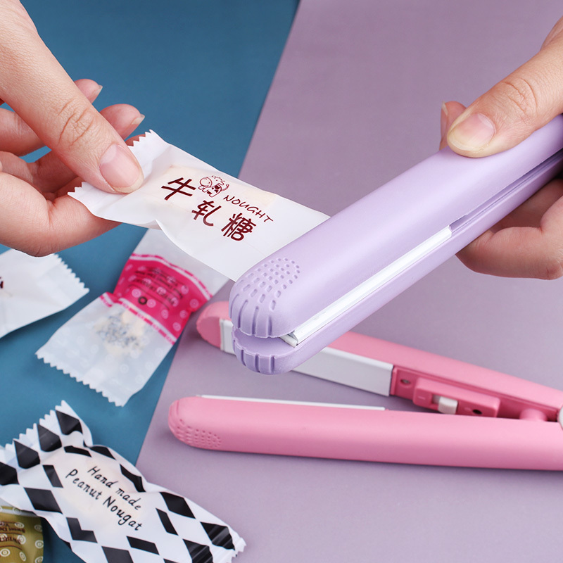小型家用迷你迷小便携式纳丽雅(Naliya)手压式雪花酥零食糖果塑料袋密封机 (蓝色波浪)封口机