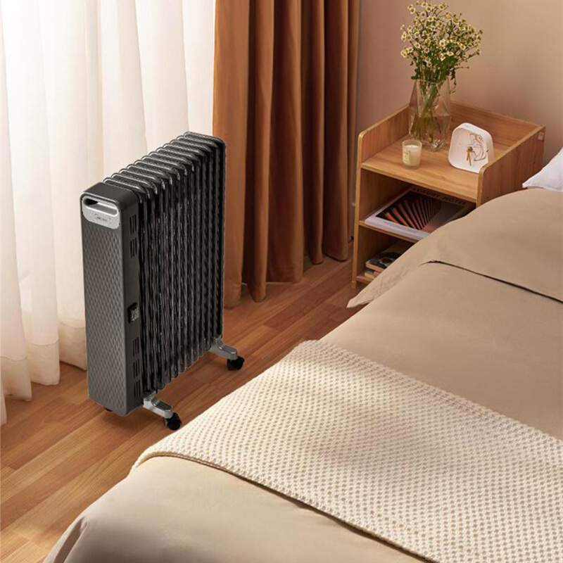 美的(Midea)取暖器油汀电暖器烤火炉13片家用办公室干衣2200W恒温镂空散热片安全防烫NYX-G1 (线下同款)