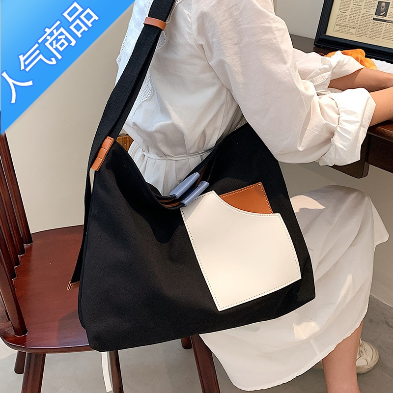 封后大容量帆布包包女2022新款潮时尚百搭单肩托特包日系斜挎通勤大包女包