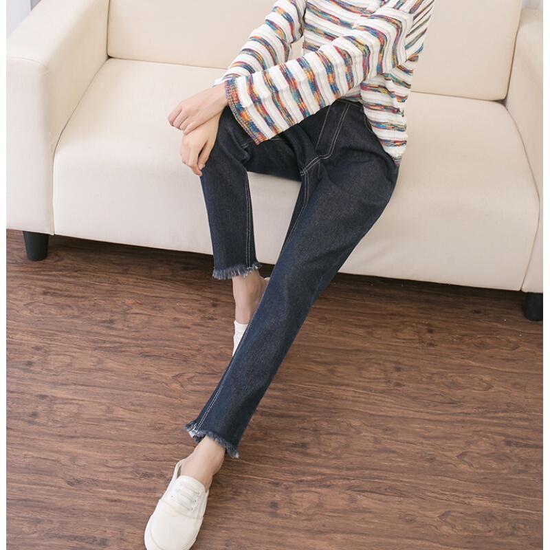 胖MM超大码显瘦高腰牛仔九分裤女加肥加大哈伦裤松紧腰宽松休闲裤黑色