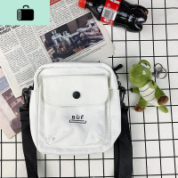 斜挎包男单肩包潮流学生休闲帆布背包男生潮牌包包ins潮小包轻便NEWLAKE 白色+恐龙