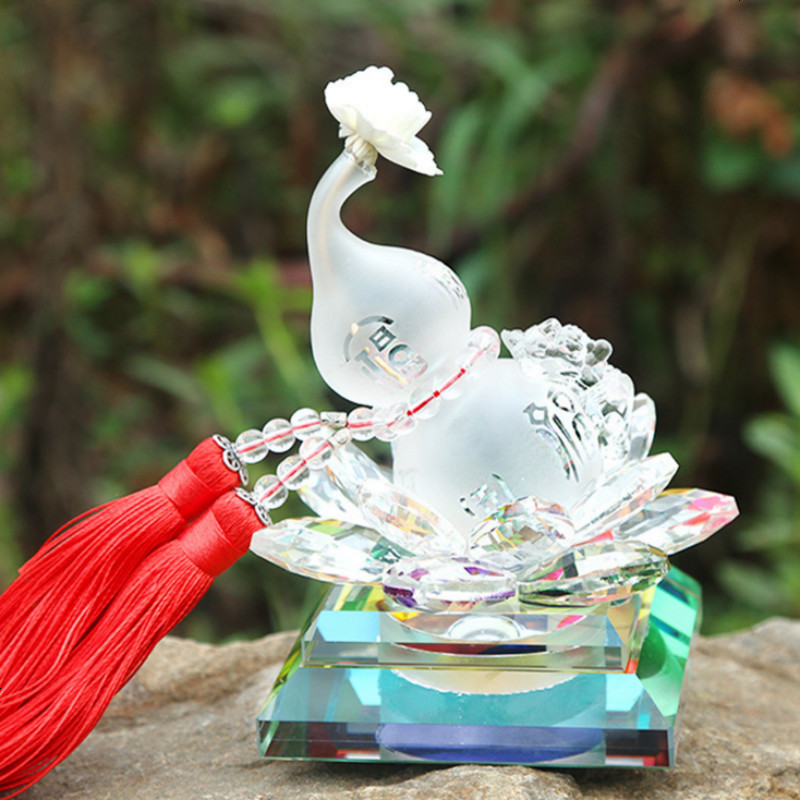 高档汽车莲花旋转摆件车载时尚水晶香水座车用香水座式摆台装饰