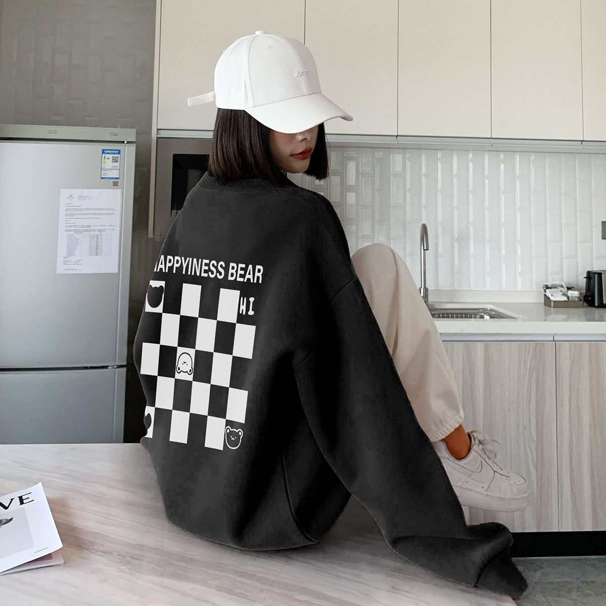 [1.5折价57元]唐狮棋盘格印花圆领卫衣女春装新款韩版个性时尚百搭酷潮范