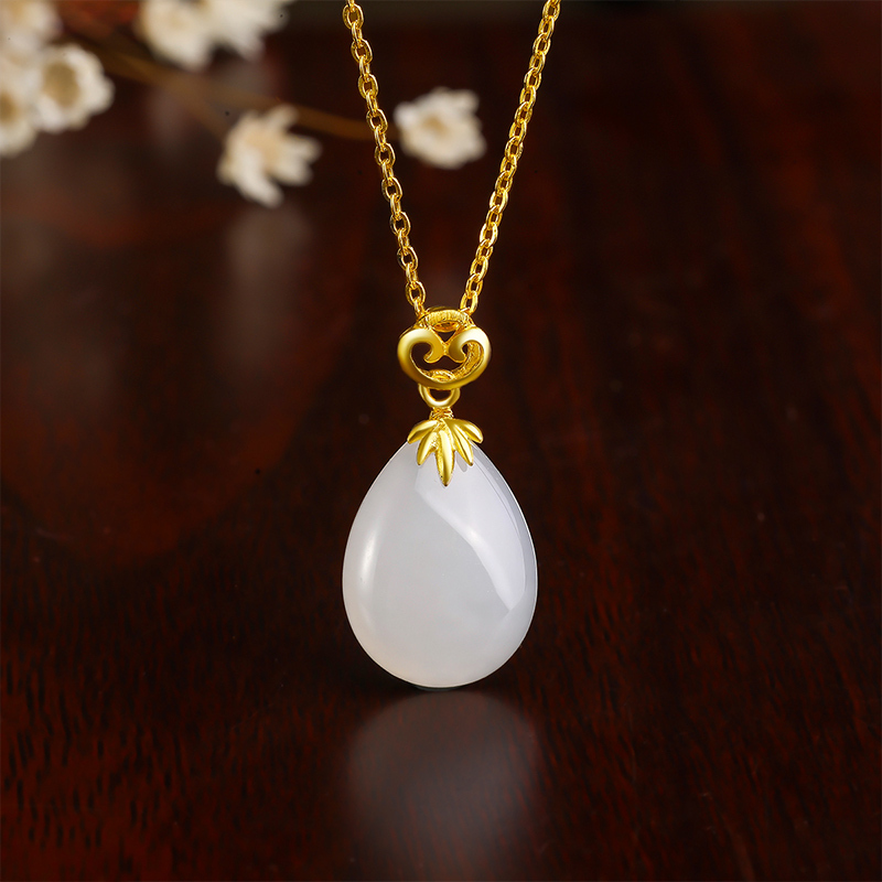 周六福珠宝黄金镶嵌和田玉吊坠女款足金玉石水滴挂件aaya042696