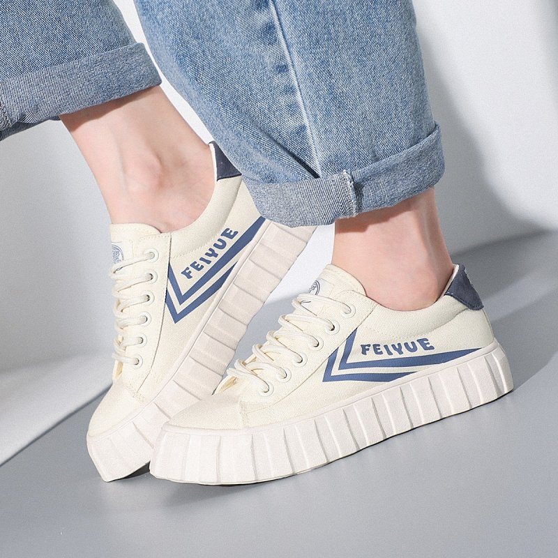 飞跃(FEIYUE)新款百搭透气板鞋厚底舒适拼色帆布鞋女款