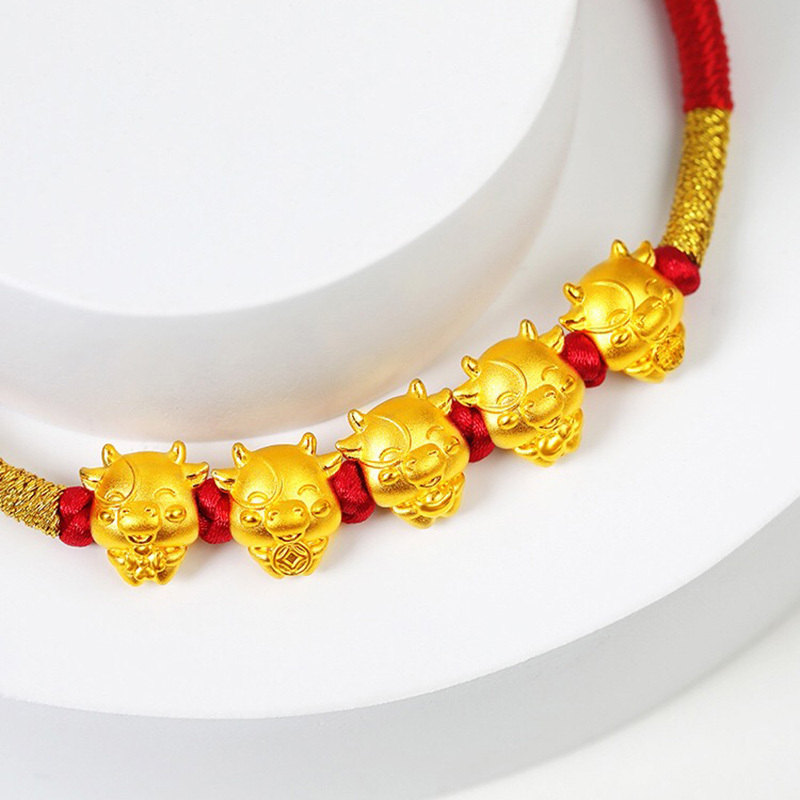 帛兰梓韵黄金手链新年手链男女款编织可伸缩小金牛手饰牛年红色手绳