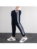 Adidas/阿迪达斯运动裤男卫裤秋季束腿舒适休闲长裤EI4491