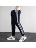 Adidas/阿迪达斯运动裤男卫裤秋季束腿舒适休闲长裤EI4491