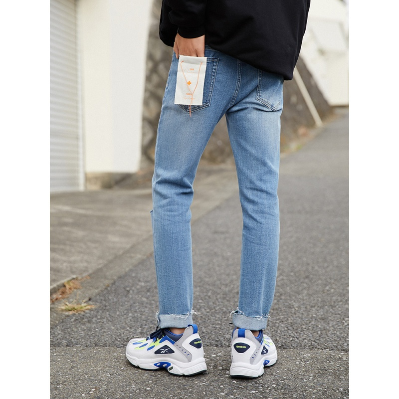 太平鸟男装破洞牛仔裤男潮流休闲2019春季新款毛边水洗牛仔长裤