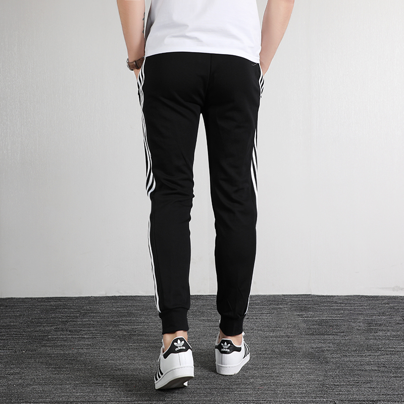 adidas阿迪达斯运动裤男卫裤秋季束腿舒适休闲长裤ei4491