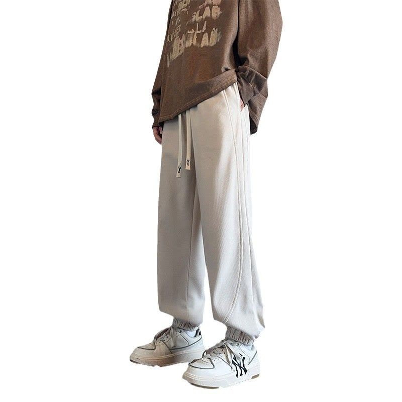 男装纯色百搭束脚卫裤男春秋季新款青少年抽绳松紧腰运动休闲裤子图片