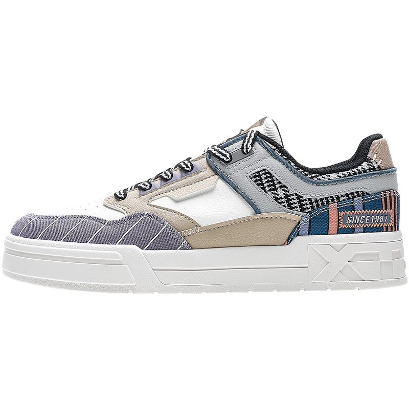 特步低帮板鞋2022冬季新款男士皮面防水休闲鞋潮流百搭男鞋滑板鞋