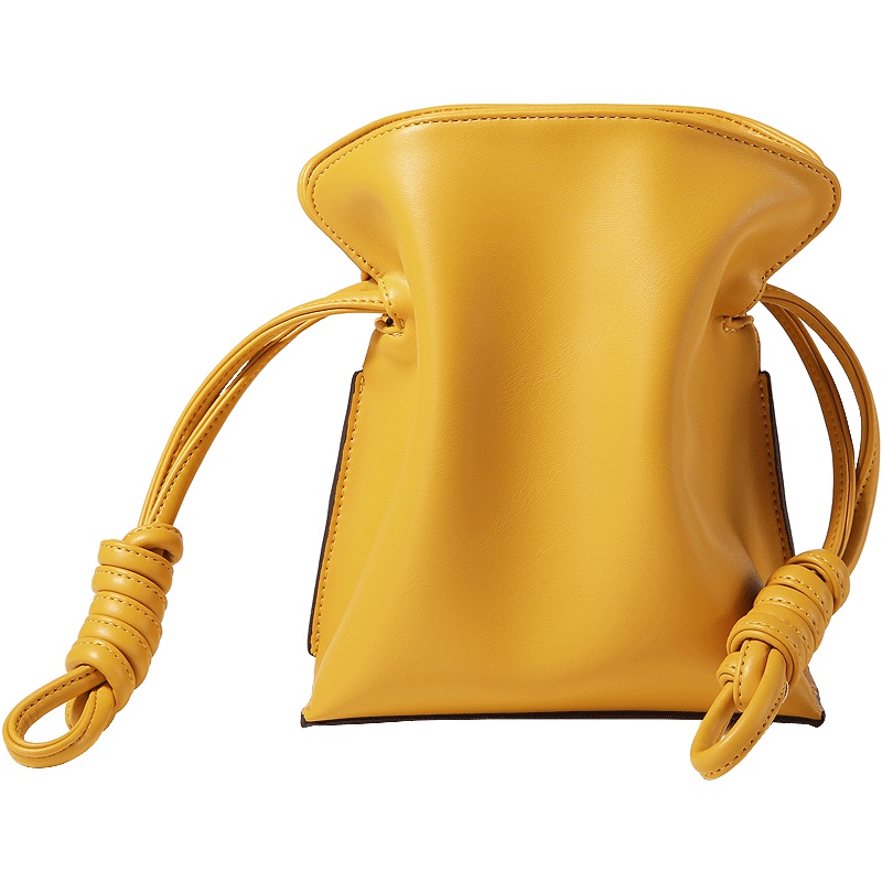 水桶包包包女2019新款法国小众洋气百搭黄色抽绳水桶包单肩斜挎包