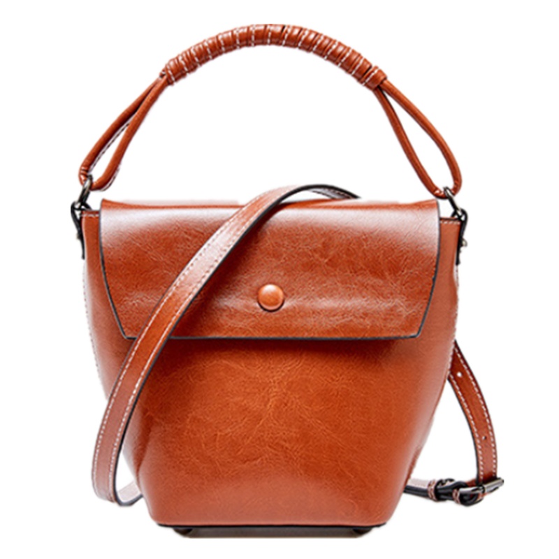 菱格三宅世家(MVO MVO LGSZSJ)2020夏季新款小众设计女包牛皮水桶包真皮竖款休闲单肩手提包