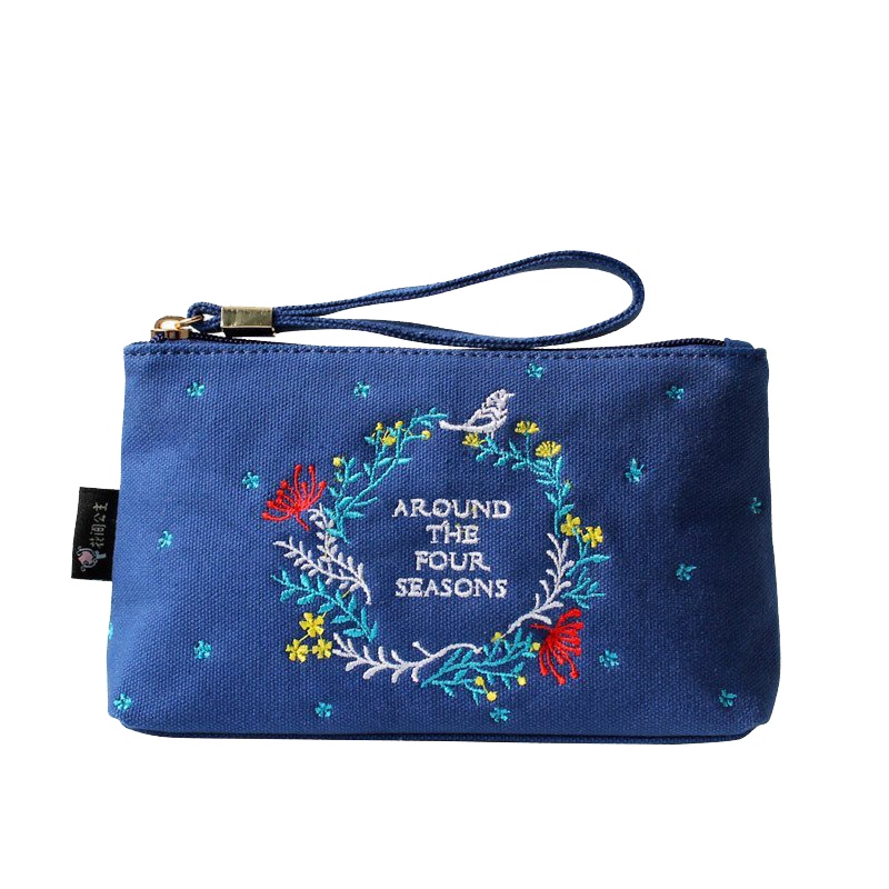 花间公主环游四季2021春季文艺女包手包刺绣潮流休闲原创时尚手拿包