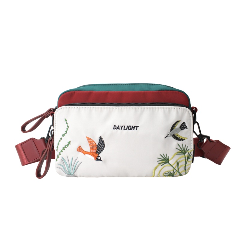 花间公主日光刺绣撞色帆布女包包2021春季新款宽带斜挎单肩手机尼龙包